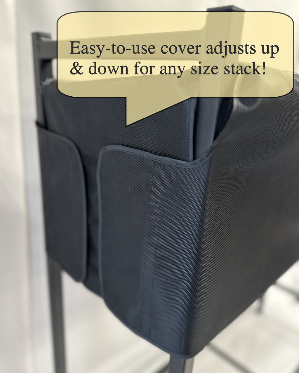 Black adjustable cover for a stackable item with text overlay on a light background
